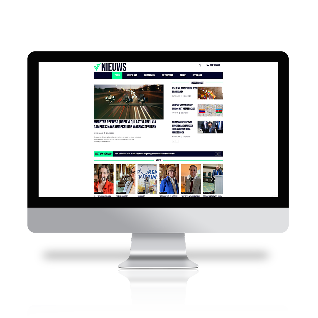 Een computermonitor met een nieuwswebsite in het Nederlands met artikelen, afbeeldingen en navigatiemenu's van Saldesign, die hun expertise op het gebied van grafische vormgeving demonstreert.